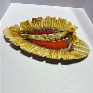 Yellow and Red Ceramic Art Piece with Scalloped Design